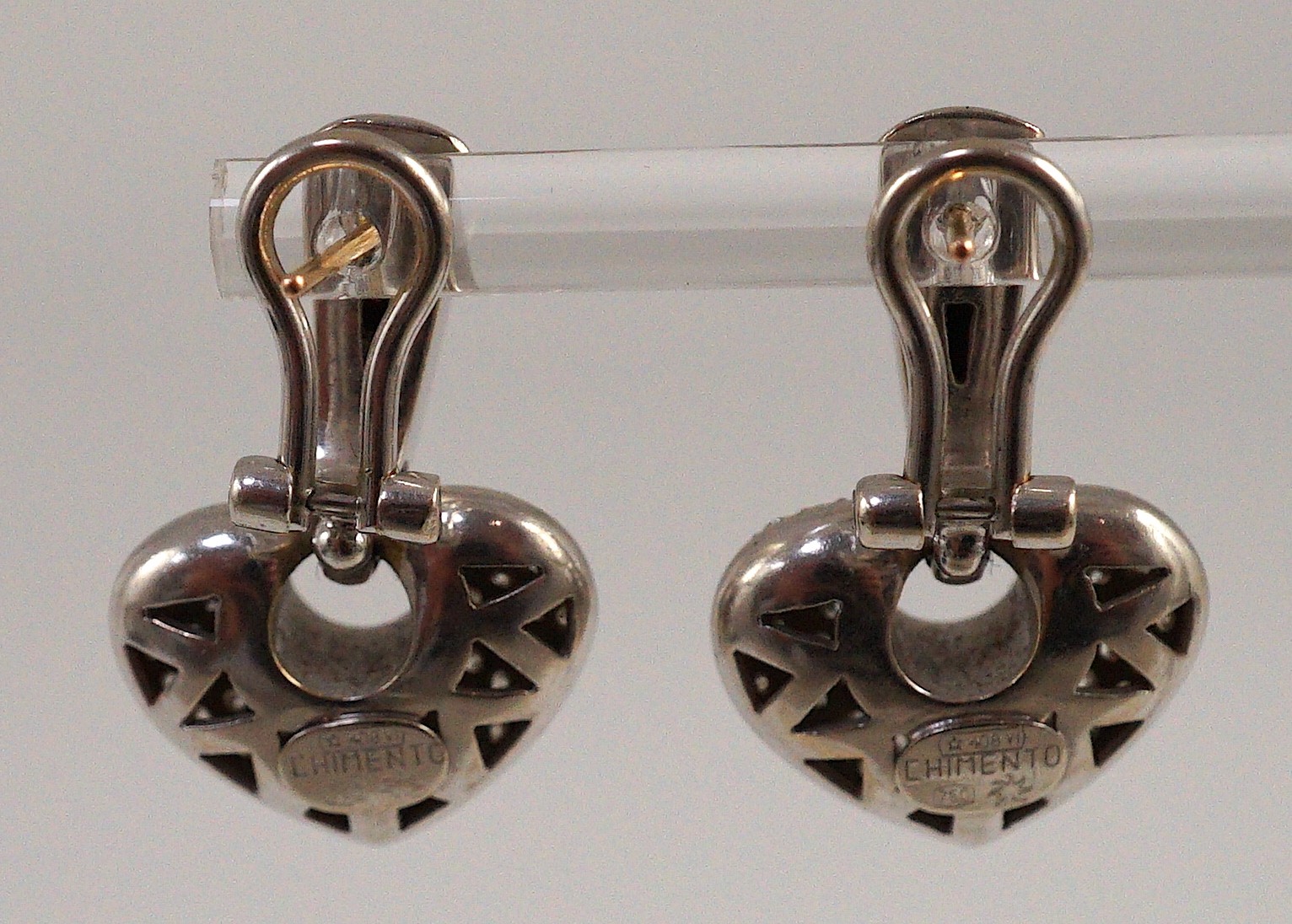 A modern pair of Italian 18ct white gold and pave set diamond heart shaped earrings, by Chimento